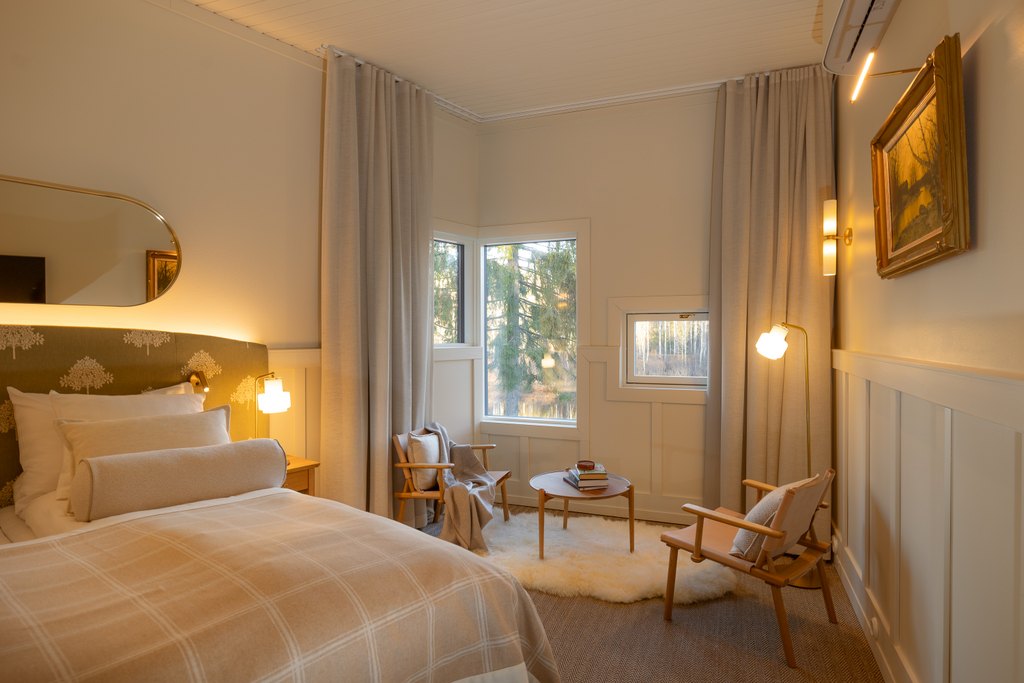 Aino Deluxe Riverview Schlafzimmer 